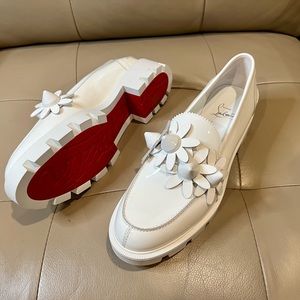 Louboutin Daisy spikes embellished leather loafers